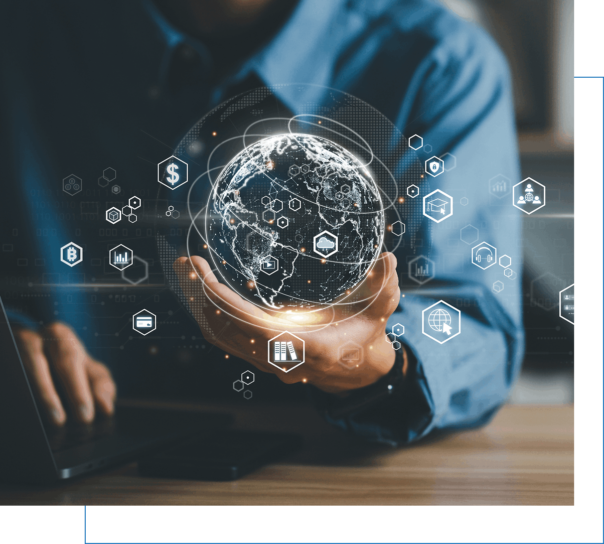 jpeg-optimizer_our service section 1 img Person holding a digital globe hologram with various technology icons, next to a laptop on a desk, symbolizing global connectivity and digital networks.